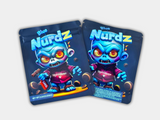 Blue Nurdz Mylar bag designed for 3.5 grams, with a box. Front & Back. This smell-proof packaging locks in potency. Features a fun design for secure storage.